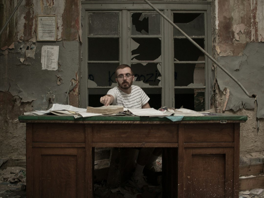 mystery writer at desk