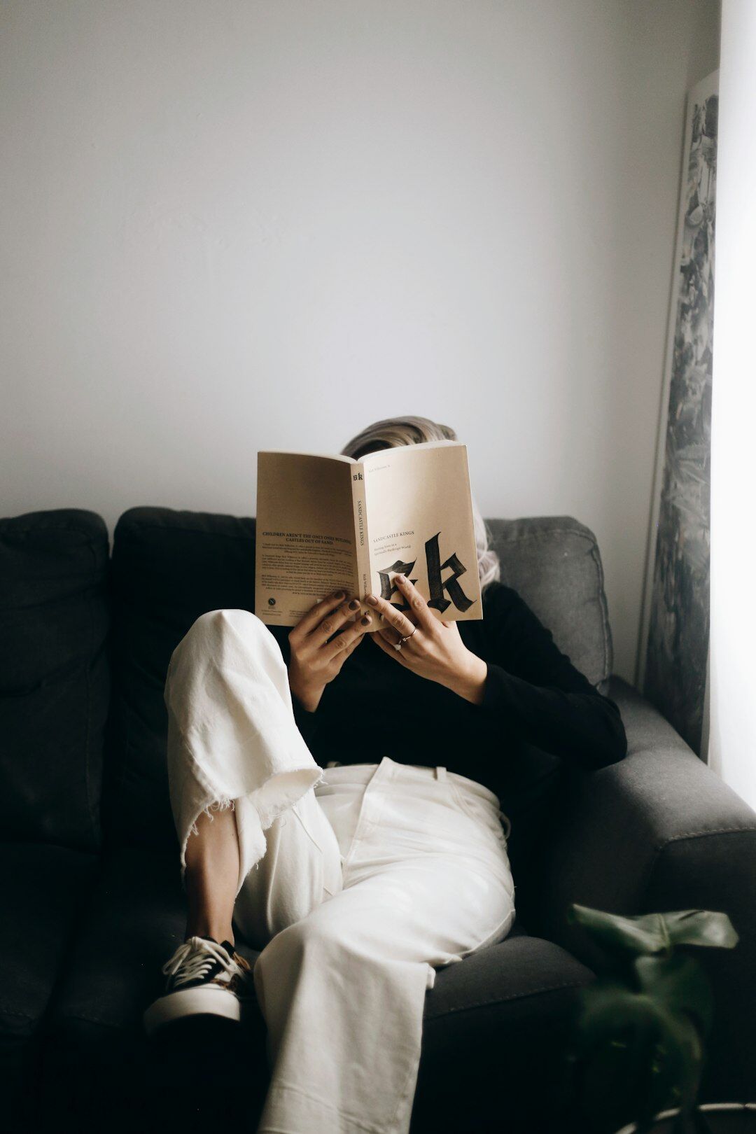 woman reading mystery book